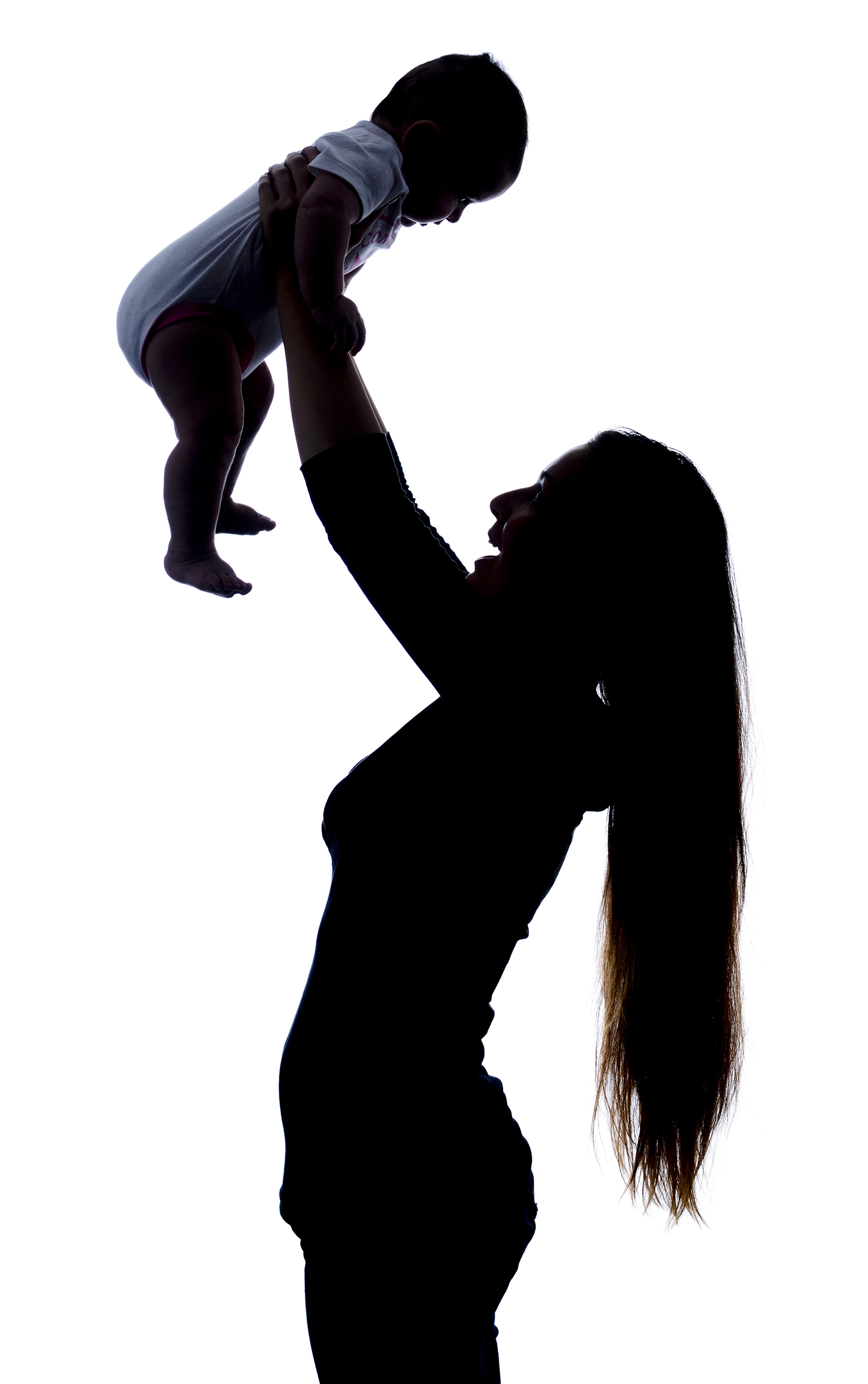 Die Silluette einer Mutter mit ihrem Baby. Schwanrschaftsfotografie von Fotostudio Reuther.