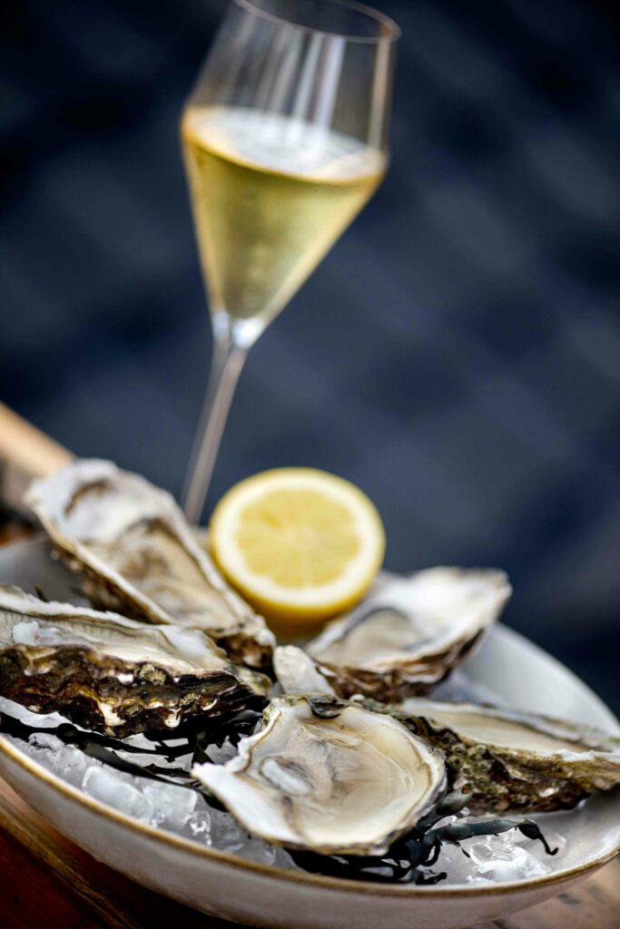 Austern und Sekt, fotografiert von Fotostudio Reuther.