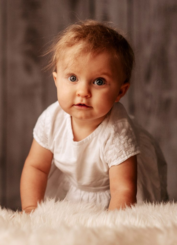 Portrait eines Babys. Babyshooting - Schwangerschaftsfotografie von Fotostudio Reuther.